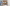 two girls jumping on double bed inside a static caravan in Woolacombe