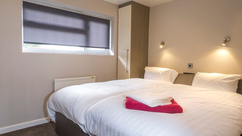 Silver apartment bedroom at Golden Coast