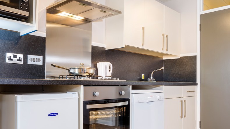 Silver apartment kitchen at Golden Coast