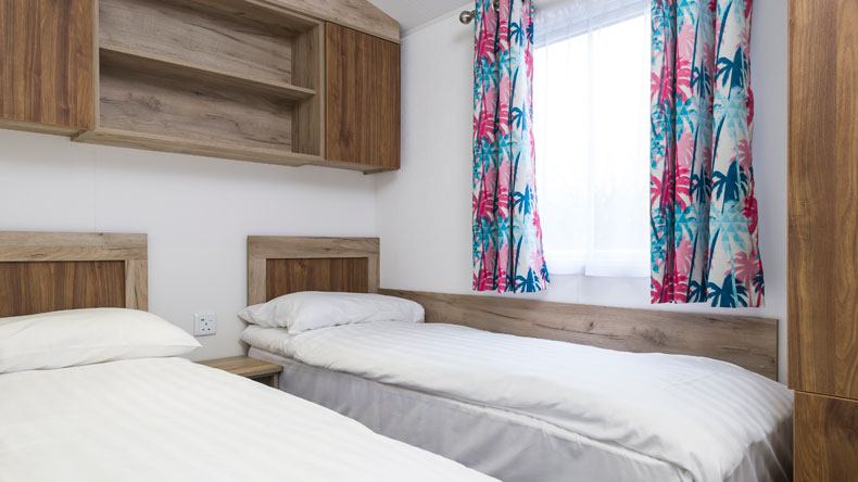 New Wave Gold caravan twin bedroom