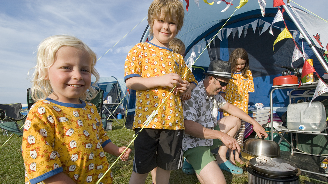 Family at their tent at Easewell Farm