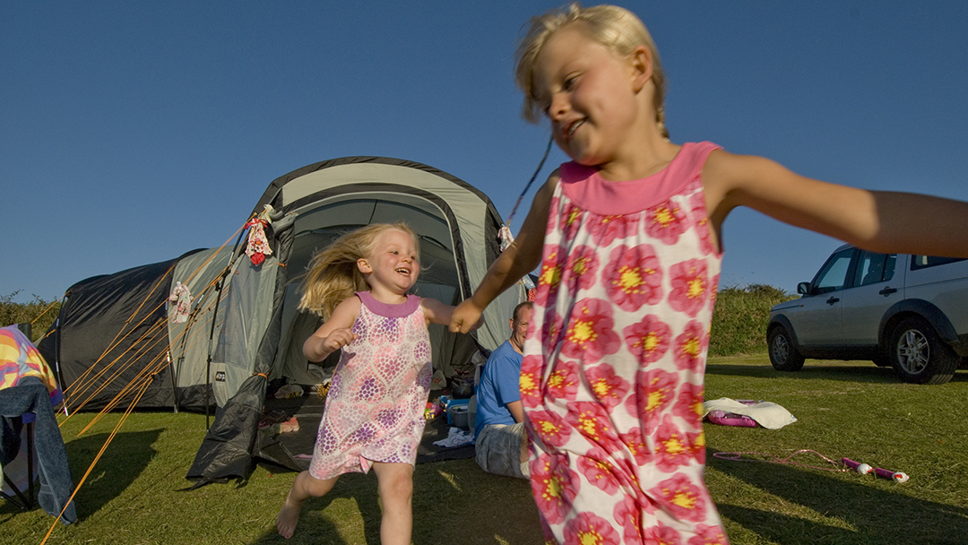 Girls at a tent at Twitchen House