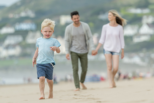 Young family on the beach in Woolacombe
